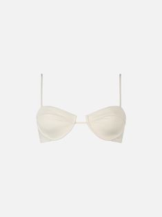 Dive into comfort and style with our Salina underwired bralette top. This elegant swimwear piece features a plain cream color, perfect for a classic yet striking beach look. Designed with adjustable shoulder straps, it ensures a personalized fit for maximum comfort and support. Composition: 90% poliammide 10% elastan Summer Bra With Padded Underwire Cups, Summer Underwire Bra With Padded Cups, Summer Nylon Bra, Poolside Bra With Removable Pads, Classic Seamless Swimwear For Summer, Elegant Strapless Swimwear With Removable Bra Pads, Elegant White Swimwear With Adjustable Straps, Bandeau Bra With Built-in Bra For Beach, Fitted Swimwear With Removable Straps For Sunbathing