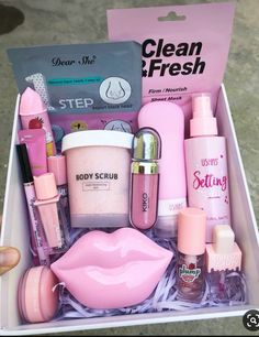 a pink box filled with lots of beauty products