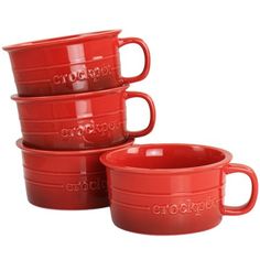 three red crockpots stacked on top of each other