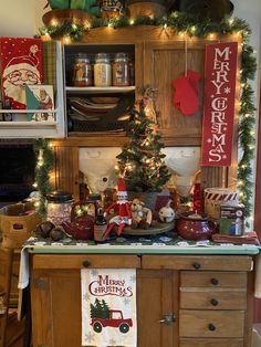 a kitchen with christmas decorations on the counter