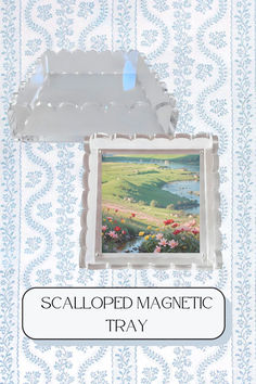 an old photo frame with the words scalloped magnetic tray on it and flowers