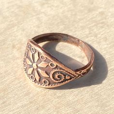 Copper ring with flower and spirals created using a hydraulic press and an impression die. Ring is size 7. Interlochen Michigan, Ring With Stone, Hydraulic Press, Copper Ring, By The Lake, Copper Rings, Stone Rings, Michigan, Copper