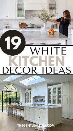 a woman standing in the middle of a kitchen with white cabinets