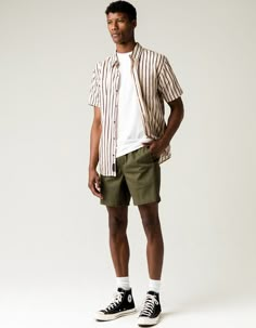 RSQ Pull On Mens Shorts. Elastic waistband with interior drawstring. Welt hand pockets. Back button pocket. Approx. inseam: 6.5. 97% BCI cotton/3% spandex. Machine wash. Imported. Shorts Aesthetic, Olive Shorts, Mens Shorts Outfits, Casual Outfits Summer, Mens Summer Outfits, Mens Casual Outfits Summer, Stylish Men Casual, Outfits Vintage