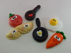 an assortment of food shaped like eggs and carrots