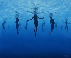 silhouettes of people swimming in the ocean with their arms out and feet above water