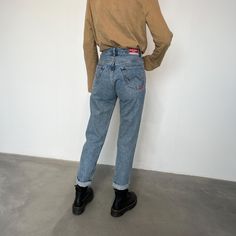 Vintage 80s blue denim jeans High-waisted denim, narrow leg, straight model Jeans Made in Italy, w 26 medium light stone wash Size on label W 26 International recommended size XS Measurements in cm: Waist/waist 31 Horse/Rise 28 Leg length 72 bottom 16 The model is 1.73 m tall, 50 kg and wears size XS / European 34 / Italian 38 Vintage jeans in excellent condition, like new Retro Straight Leg Jeans For Streetwear, Retro Denim Jeans With Tapered Leg, Retro Tapered Leg Denim Jeans, Fitted 90s Inspired Denim Jeans, 90s Inspired Fitted Denim Jeans, Retro Straight Leg Denim Jeans, Retro Denim Tapered Leg Pants, Retro Fitted Straight Leg Jeans, Retro Straight Leg Jeans For Spring