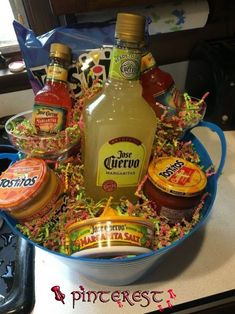 an assortment of condiments in a blue bowl