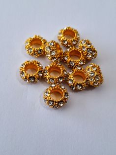 Set of 10 sister loc beads made with textured brass and embedded rhinestones.  Hole size is 4mm, fits very small locs and braids. Gold Jewelry With Rhinestones And Round Beads, Gold Crystal Beads With Spacer Beads, Small Locs, Loc Beads, Braid Beads, Macrame Crafts, Loc Jewelry, Hair Rings, Accessories Hair