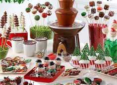 a table topped with lots of desserts and candy