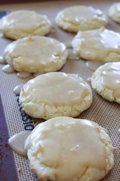 cookies with icing on a baking sheet ready to be baked