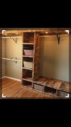 an empty room with some shelves and baskets