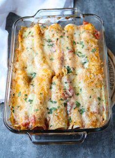 a casserole dish filled with meat and cheese