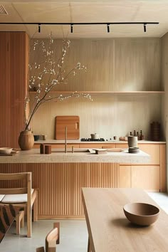 Japandi style kitchen with neutral tones and streamlined design. Japanese Interior Design Kitchen, Japandi Interior Design Kitchen, Zen Kitchen Design, Japandi Interiors Kitchen, Kitchen Design Scandinavian, Japandi Kitchen Ideas, Japandi Kitchen Design, Scandinavian Interior Kitchen