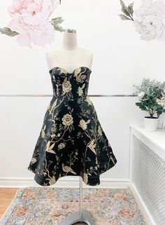 Sparkle and shine your way into any event in this beautiful satin jacquard dress with oversized gold threaded florals and birds. The bodice is shaped in a flattering bustier style cut with full boning, underwires and foam cups. The skirt has the perfect blend of structure and movement.This dress is knee length (25" from waist), can be made mini, tea or floor length by request.☽♡☾ Made in Canada with high quality materials, fully lined with cotton for a comfortable feel.Please note: While most it Holiday Party Dress, Bird Embroidery, Holiday Party Dresses, Jacquard Dress, Gold Threads, Gold Floral, Holiday Party, Holiday Parties, Floor Length