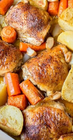 chicken, potatoes and carrots in a white casserole dish