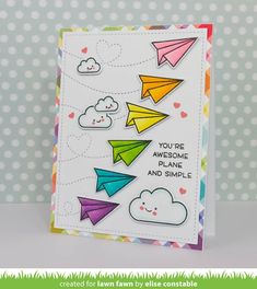 a card with some paper planes on it