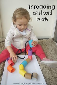 Threading activity for toddlers using large cardboard beads - Laughing Kids Learn Uppfostra Barn, Activity For Toddlers, Easy Toddler Activities, Baby Play Activities, Baby Activities, Montessori Toddler