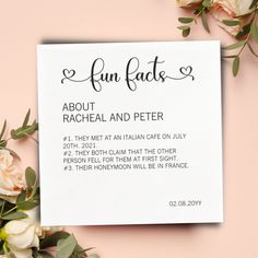 a white card with the words fun fact about rachel and peter on it next to some flowers