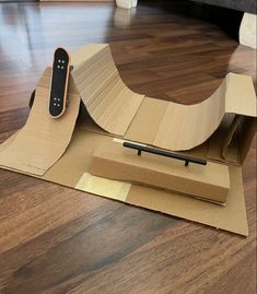 a skateboard is sitting on top of some cardboard