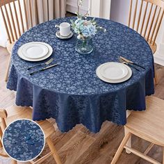 a blue table cloth with white plates and silverware sits on top of a wooden chair