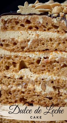 a close up of a slice of cake on a plate with the words dulce de leche