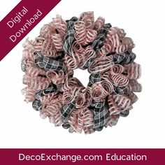 a pink and black ribbon wreath with the words decoex exchange com education