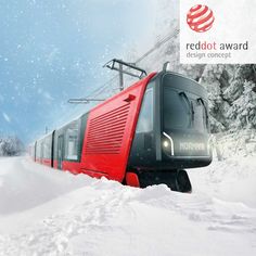 a red and black train traveling down tracks in the middle of snow covered ground next to a ski lift