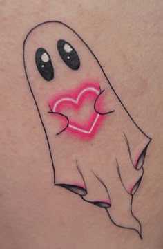 a ghost with a heart on it's chest tattoo design for womens stomach