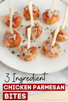 chicken parmesan bites on a white plate with text overlay that reads 3 ingredient chicken parmesan bites