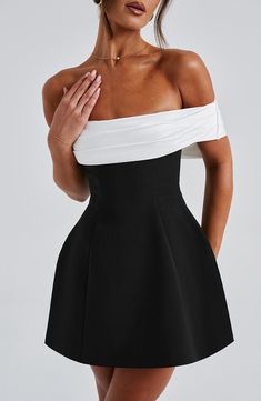 This oh-so-romantic. yet modern style is top of our wishlists. Make a statement in Delta. designed with a contrast bardot neckline that shows off your shoulders. and adorned with a dreamy bow detail to the back. In a playful mini length. the look is complete with a rounded. bubble shape skirt. Colour: Black/White. Premium non-stretch crepe. Fully lined. Contrast bardot neckline. Bow detail to back. Rounded. bubble shape skirt. Invisible zipper fastening. Mini length. Black And White Mini Dress, Split Long Dress, Comfy Jumpsuits, Cap Decoration, Bardot Neckline, Bubble Skirt, Off Shoulder Fashion, Black And White Dress, Backless Mini Dress