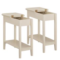 two white side tables with one drawer open and the other closed, both are facing each other