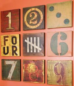 the wall is decorated with different types of numbers