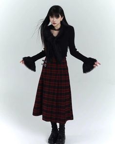 A skirt with a classic side belt. 

A mature piece with a deep plaid pattern that is typical of fall and winter. 

It goes well with long boots for a very modern style. 

◾️Model
Height/Weight: 167cm/48kg
Try size: S



Size (cm)
Skirt length
Waist


S
79
64


M
80
68


L
81
72 Chic Long Sleeve Cardigan With Faux Fur Trim, Chic Faux Fur Trim Cardigan For Fall, Chic Cardigan With Faux Fur Trim For Fall, Chic Fall Cardigan With Faux Fur Trim, Chic Winter Cardigan With Faux Fur Trim, Gothic Winter Sweater, Fitted Long Sleeve Cardigan With Faux Fur Trim, Fur Vest Outfits, Long Plaid Skirt