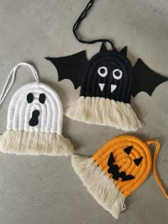 two handmade halloween decorations on the floor