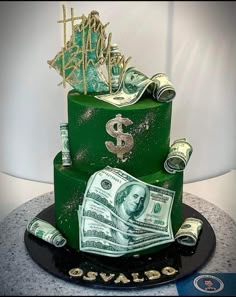 a green cake with dollar bills on top