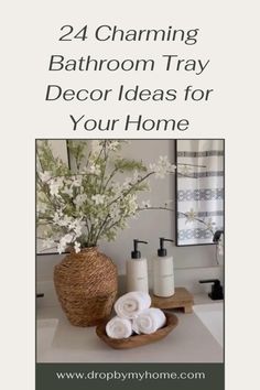 a bathroom with white towels and flowers in a basket next to the sink, on top of