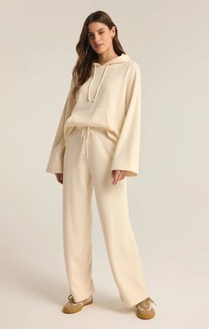 Take fashion and comfort to the next level with the Feeling the Moment Set - a lounge in style cream two-piece hoodie set. Embrace the moment and relax with this playful and versatile outfit. Upgrade your loungewear game! Taylor Swift Dress, Women Lifting, Maxi Jumpsuit, Athleisure Tops, Silk Bottoms, Lift Off, Hoodie Set, Leather Denim, Versatile Outfits