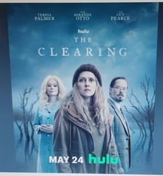 a movie poster for the clearing with two people standing next to each other on a blue background