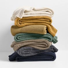 stack of folded towels on white background