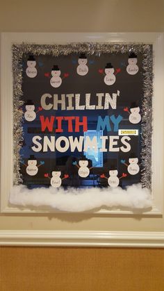 a bulletin board with snowmen on it in the middle of a room that says chillin'with my snowmies