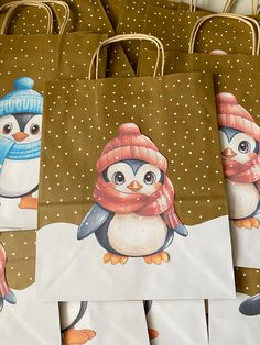 several bags with penguins painted on them