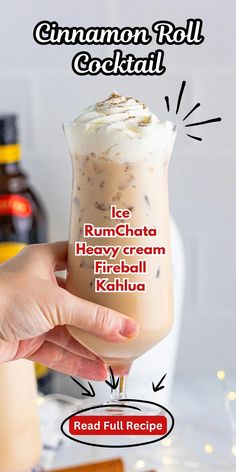 a person holding up a drink in their hand with the caption ice rumchat heavy cream fireball kahlua