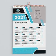 a blue and black calendar with the year 2021 on it, next to a white background