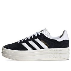 The adidas Gazelle Bold 'Black White' is the perfect sneaker for any occasion. With its iconic silhouette, this sneaker is crafted from buttery soft leather with a three-stripe detail for a sporty feel. It's stacked three layers high for a fresh perspective on the classic style. Suitable for adults, this sneaker is perfect for any activity, from running to casual outings. Inspired by the 70s, the Gazelle is a timeless classic that is still beloved today. Get your hands on this stylish sneaker an Adidas Low-top Leather Platform Sneakers, Adidas Platform Sneakers With White Sole And Logo, Adidas Logo Leather Lace-up Platform Sneakers, Adidas Leather Platform Sneakers For Streetwear, Adidas Low-top Platform Sneakers With White Sole, Adidas High-top Platform Sneakers With Logo, Adidas Sporty Platform Sneakers With White Sole, Sporty Adidas Platform Sneakers With White Sole, Adidas High-top Leather Platform Sneakers