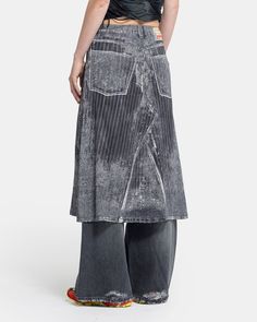 Diesel O-Hanna Denim Skirt in Black The O-Hanna Skirt features a realistic trompe l’oeil print across a soft, stretch satin midi silhouette, referencing the pinstriped devoré-denim runway look of the previous season. The skit has an A-line shape and a subtle side zip closure. - 95% Viscose, 5% Elastane. - Made in China. - Dry clean. - A13982 0LIBA. A13982 0LIBA 9XXA Tara is 6'0 (183cm) and is wearing a size M. Diesel Skirt, Denim Runway, Diesel Denim, Eckhaus Latta, Stretch Satin, Inspiration Board, Issey Miyake, Helmut Lang, British Indian