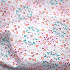 a pink and blue floral print fabric