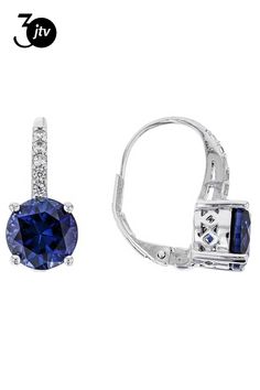 4.60ctw round lab created blue sapphire with .20ctw round lab created white sapphire rhodium over sterling silver earrings. Measures approximately 11/16"L x 5/16"W. Lever backings. Sapphire Cubic Zirconia Round Earrings, Round Sapphire Cubic Zirconia Earrings, Sapphire Earrings With Diamond Accents, Blue Round Jewelry With Channel Set, Silver Earrings With Diamond Accents And Lab-created Sapphire, Silver Earrings With Lab-created Sapphire And Diamond Accents, Formal Round Lab-created Sapphire Earrings, Round Lab-created Sapphire Jewelry With Channel Set, Elegant Jewelry With Channel Set Lab-created Sapphire