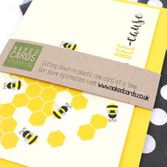 two cards with bees on them sitting next to each other and one has a sticker