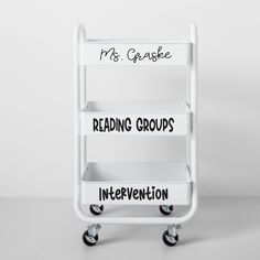 a white cart with writing on it and the words don't 1, 2, 3 reading groups